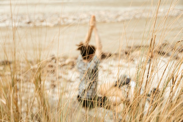 woman practicing the act of surrendering