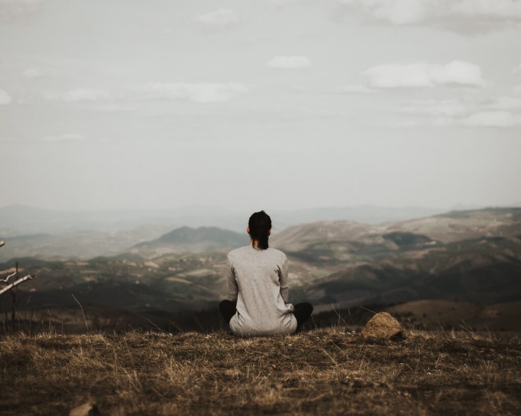 woman pausing to practice her mindset shift