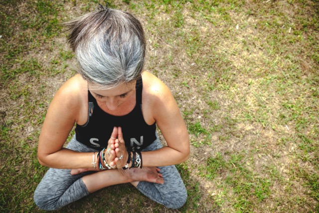 woman in her 60s practicing yoga knowing its never too late to pursue her passions 