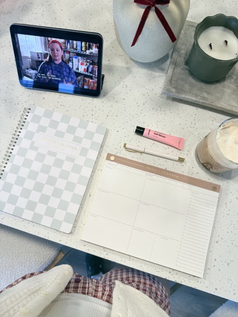 Calendar and notebook out with a show, ready to brain dump and clear out any mental clutter