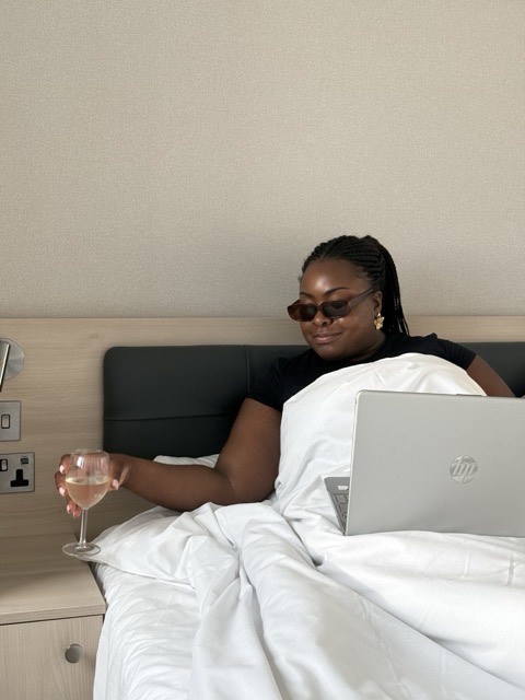 Woman working, already establishing her 'enough' for that work session to avoid burnout